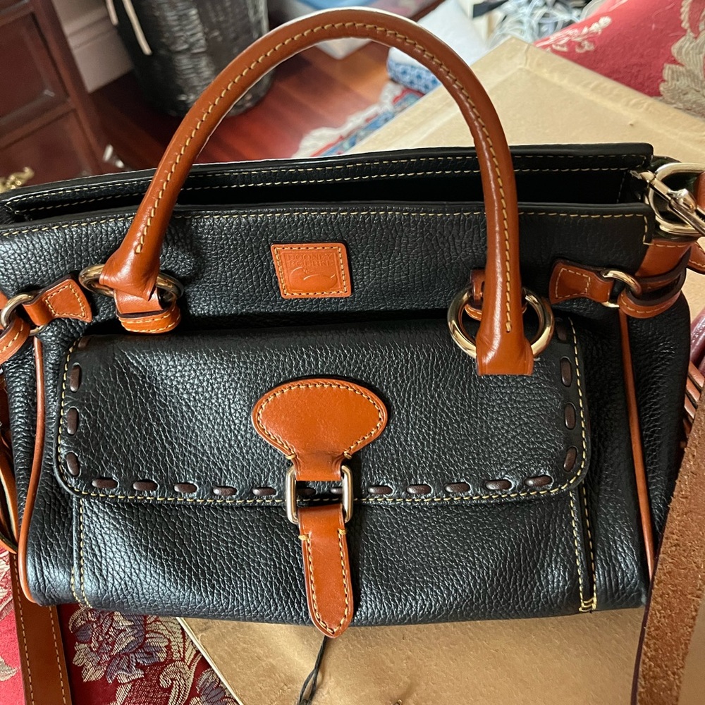Dooney and Bourke like new, lightly used.